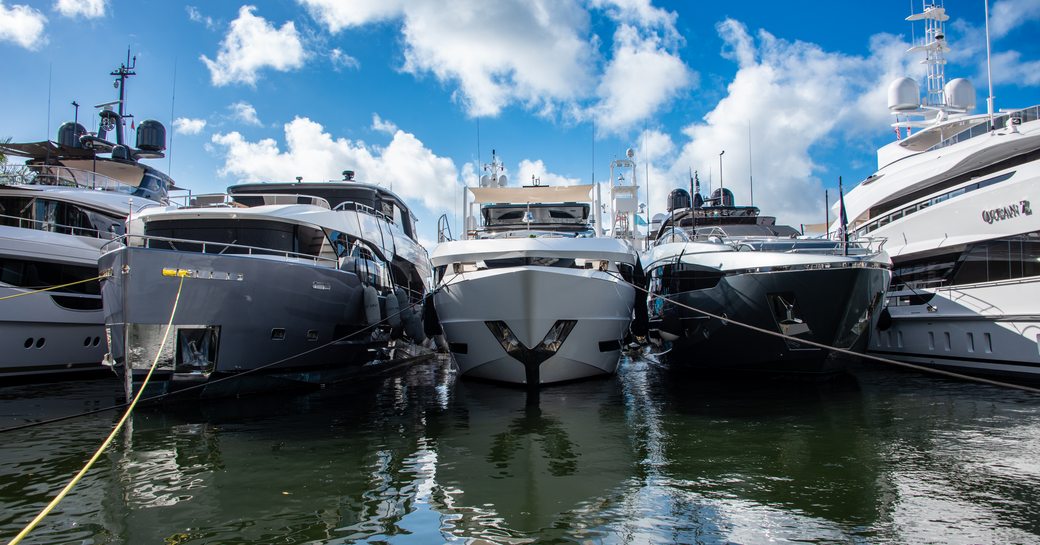 Line of superyacht bows at FLIBS