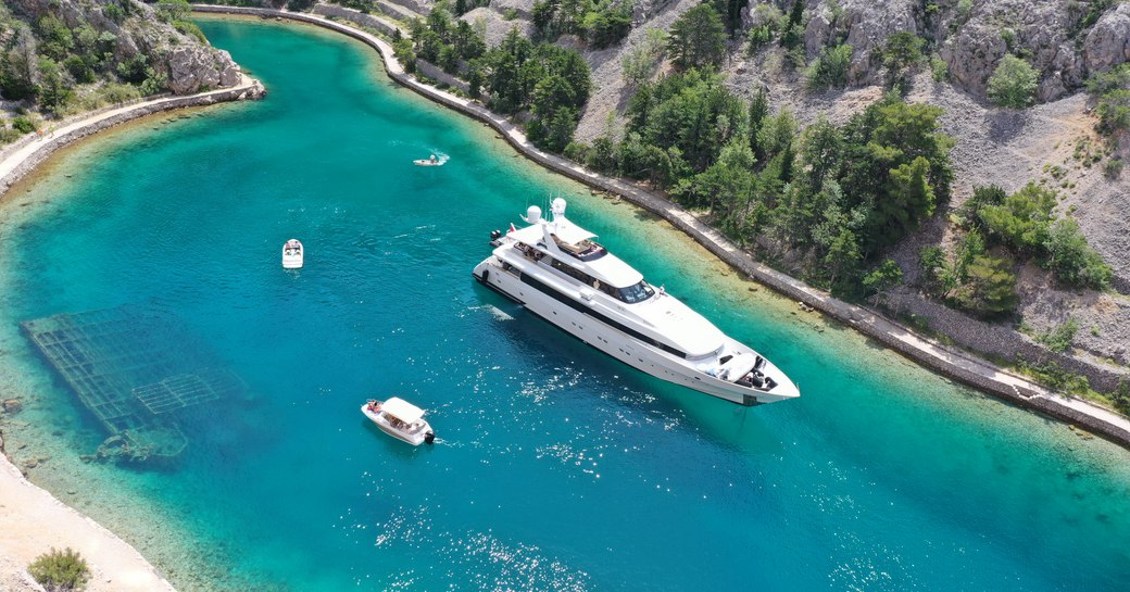 luxury motor yacht on glistening blue waters in the South of France