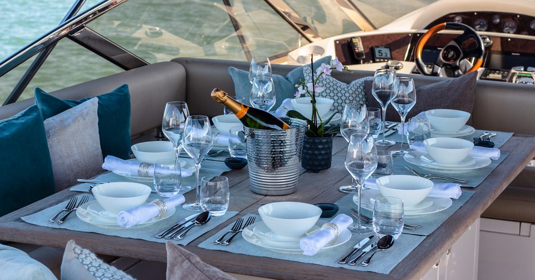 sundeck on luxury sunseeker yacht chess with elegant tablescape 