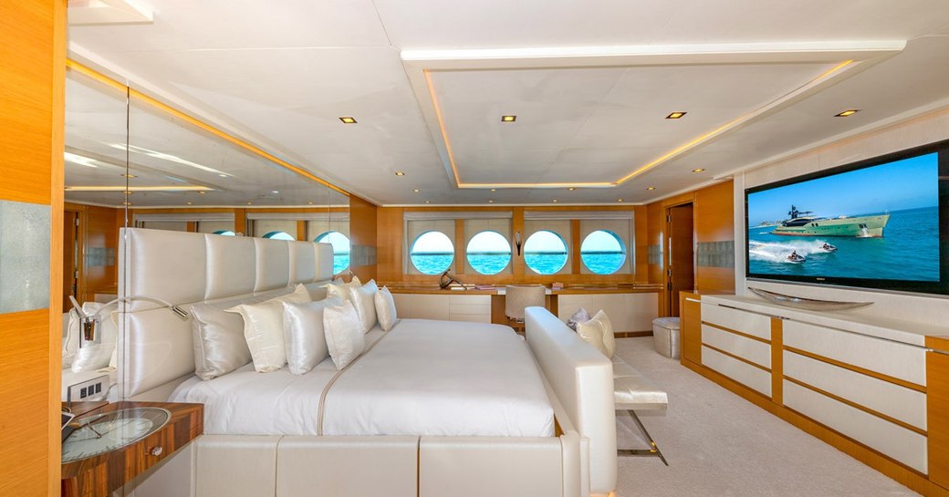 Spacious master cabin with central berth onboard charter yacht DB9