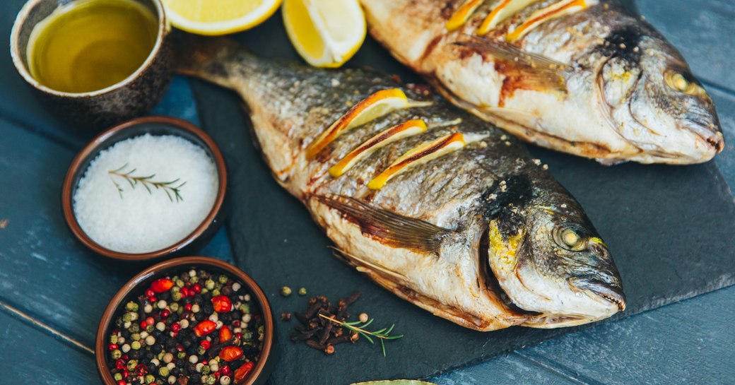 Fish cooked and presented with condiments in Corsica