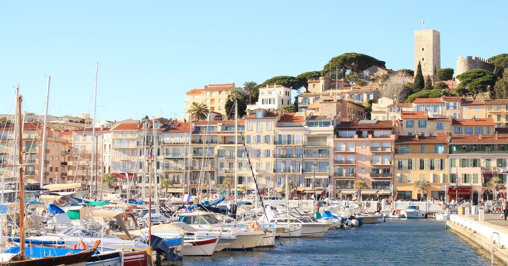 Overview of Vieux Port in Cannes, many sailing boats berthed.