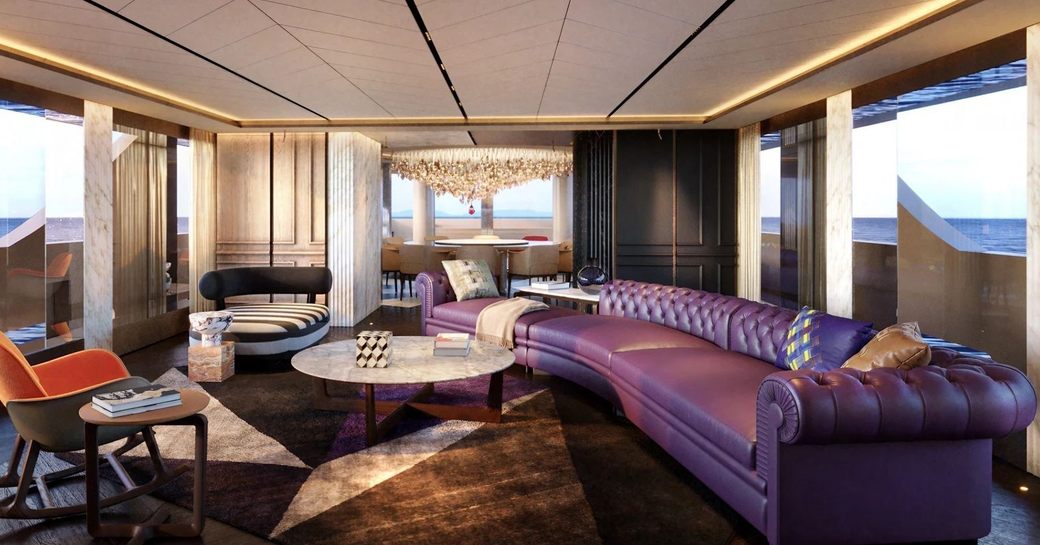 Overview of the main salon lounge onboard superyacht charter RAJA with plush seating and large windows to starboard