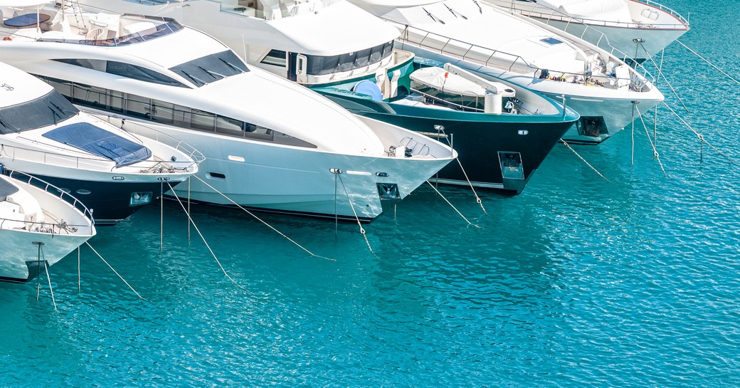 yachts berthed in marina