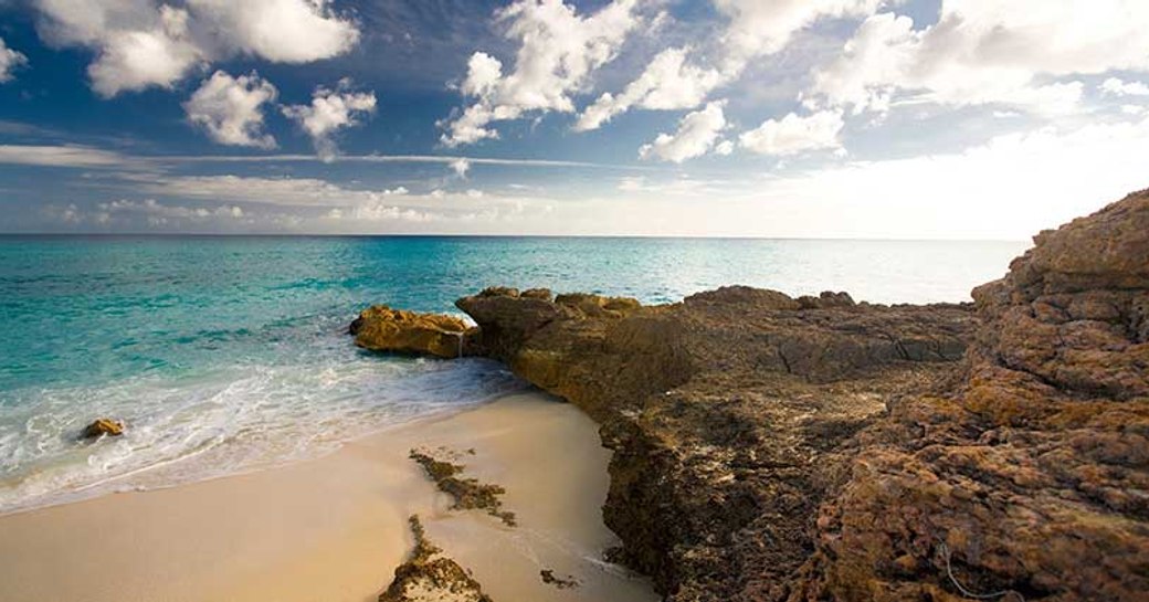 A rocky coastline and beach of Saint Martin