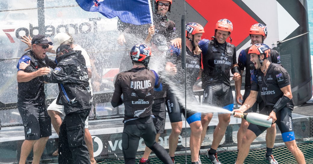 Emirates Team New Zealand celebrate on ACC after wining the 35th America's Cup Match