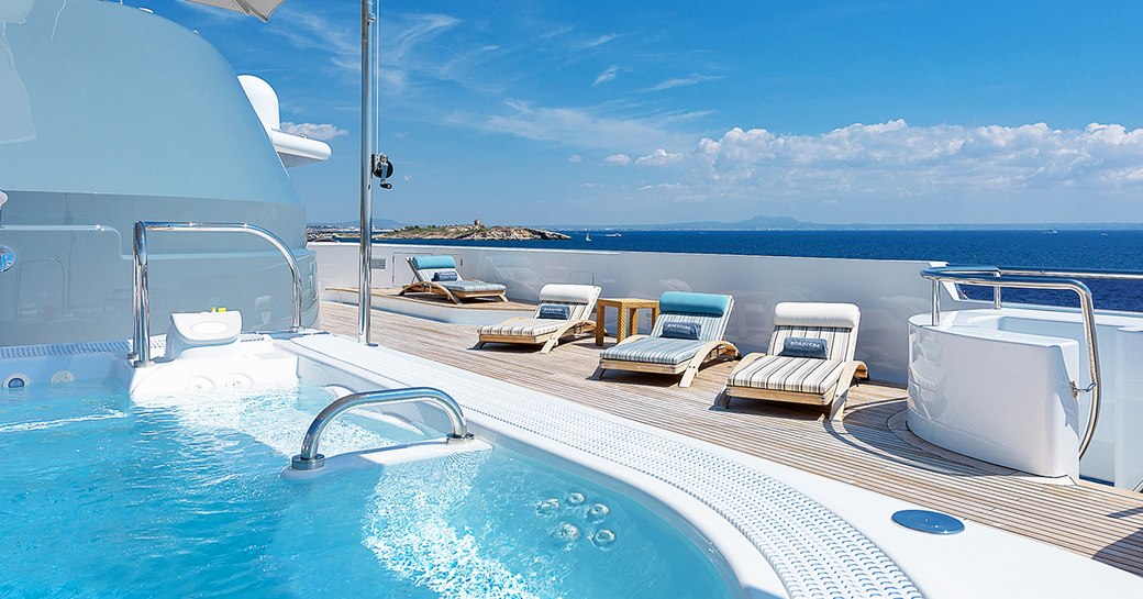 step-up pool and sun-loungers on the sundeck luxury yacht BOADICEA 