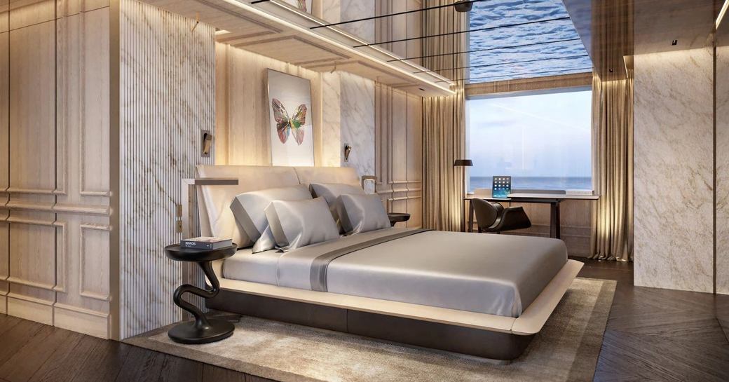 Master cabin onboard superyacht charter RAJA² with central berth and large window