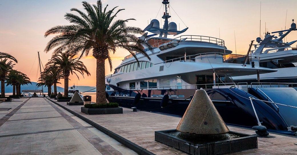 yacht in Porto Montenegro marina at sunset