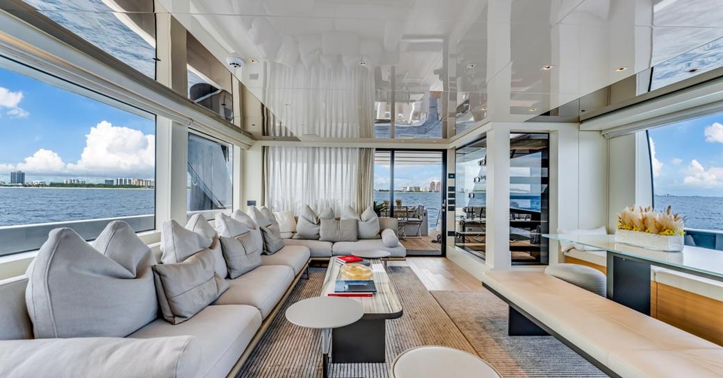 Natural hues in main salon of superyacht charter NOTYNOG