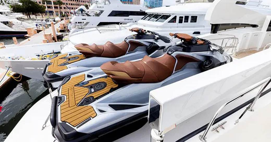 Jet Skis on the swim platform of charter yacht INVICTUS