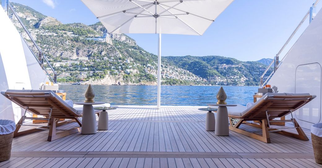 Beach club and sun loungers onboard charter yacht LUNA