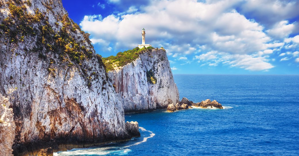 lighthouse on the cliff of Cape Lefkatas in Greece