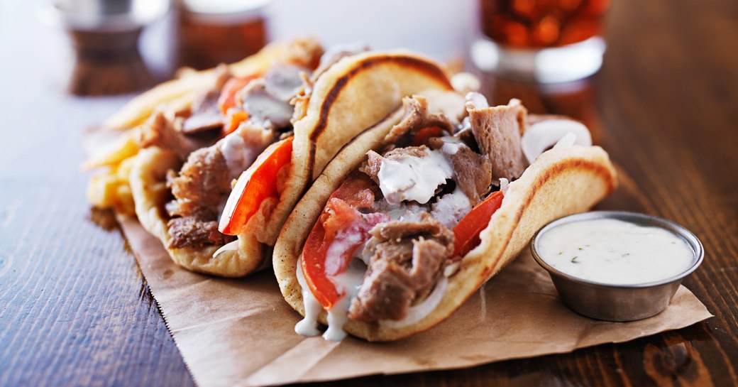 lamb gyro with greek salad and tzatziki sauce served in Greece