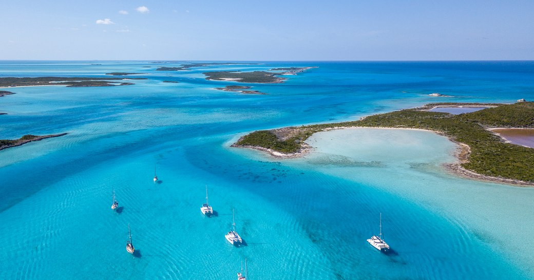 yachts anchored down in the Exumas, Bahamas