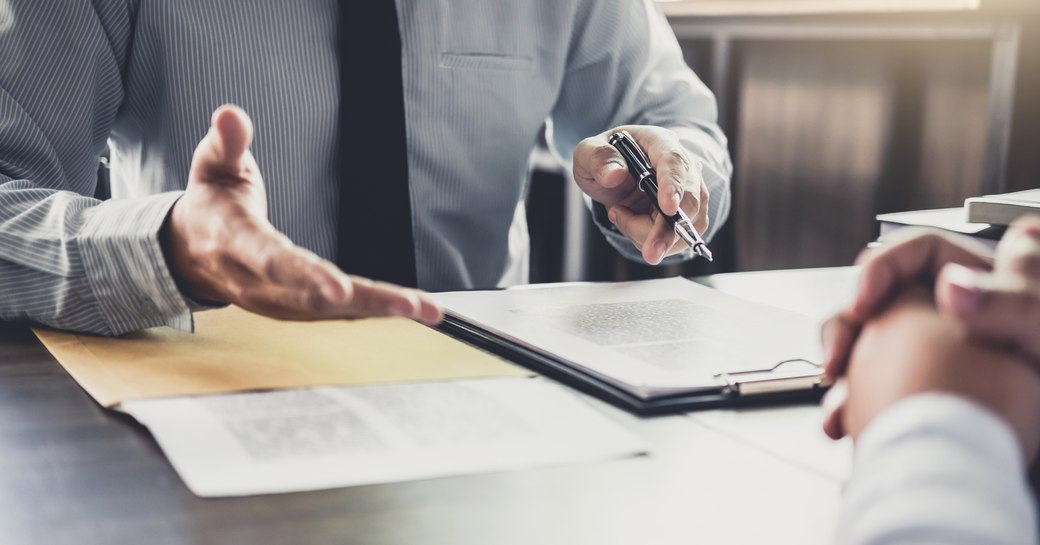 Man in suit offers professional broker advice