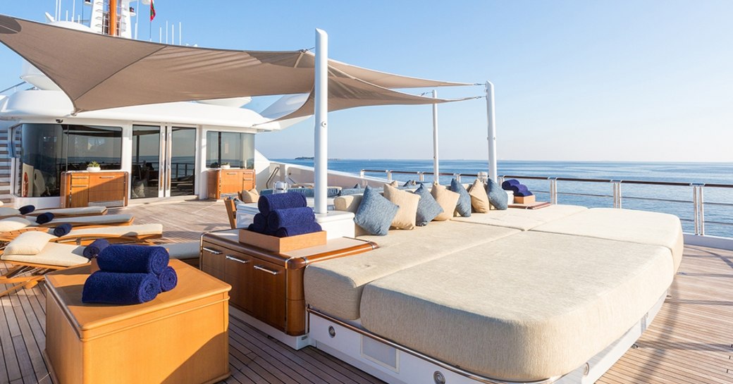 sunpads and seating on the sundeck of superyacht WHEELS