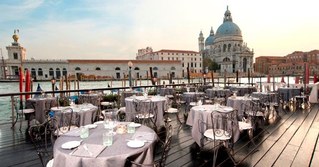 dine at De Pisis Restaurant, Bauer Hotel on a venice film festival yacht charter