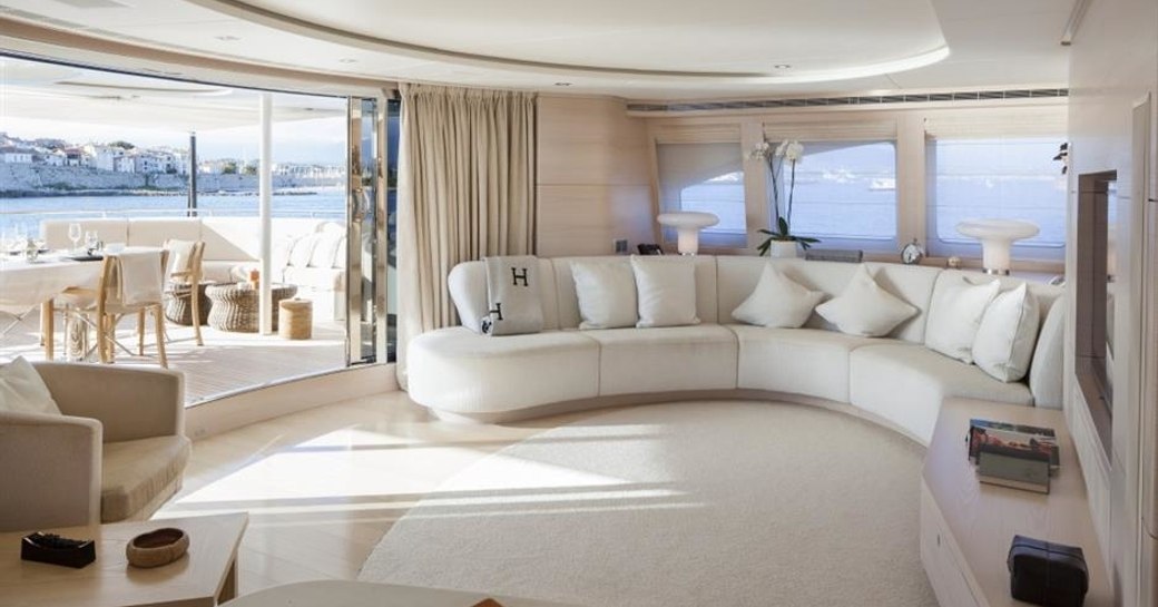 multifunctional skylounge with curved sofa aboard charter yacht G3 