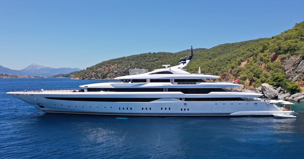 Charter yacht O'PARI at anchor in a bay