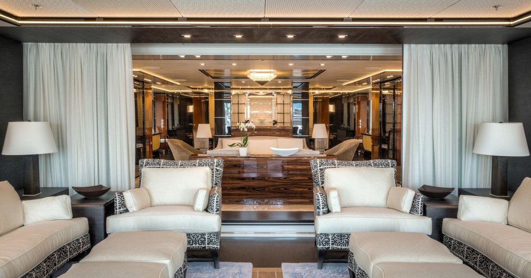 inside/outside veranda and main salon beyond aboard superyacht Party Girl