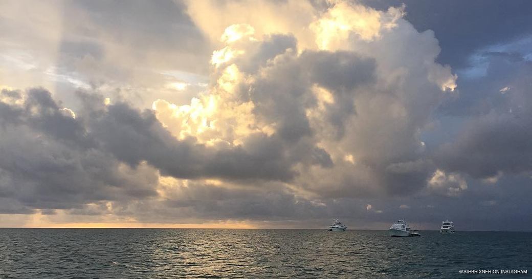 Sun behind clouds over the sea 