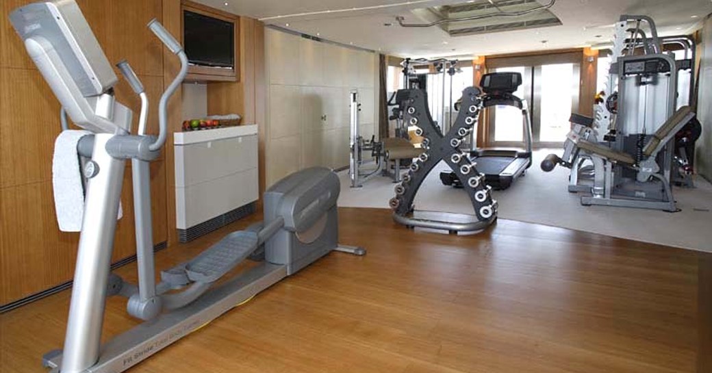 gym on board luxury yacht wheels