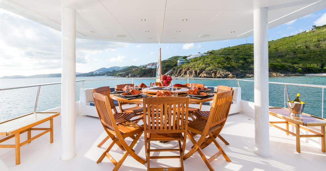 alfresco dining on upper deck of superyacht ‘Sea Falcon’ 