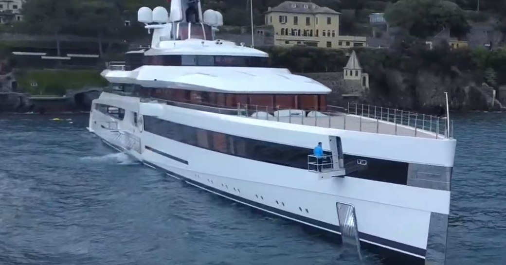 Lady S at anchor in Portofino, with crew member on bow