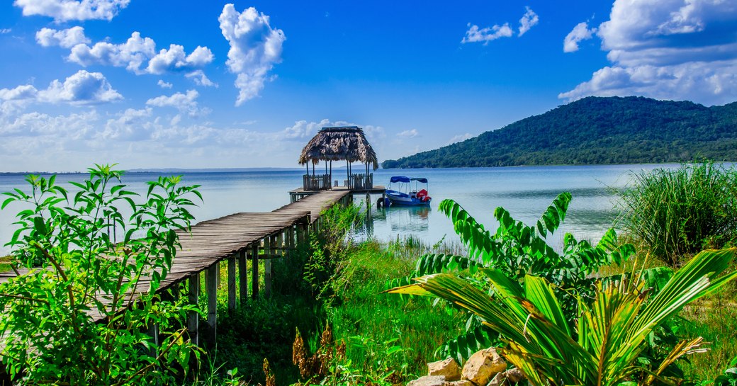 A pontoon reaching out in to a bay in Indonesia