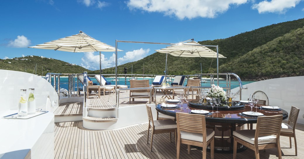 alfresco dining on sundeck of motor yacht MEAMINA 