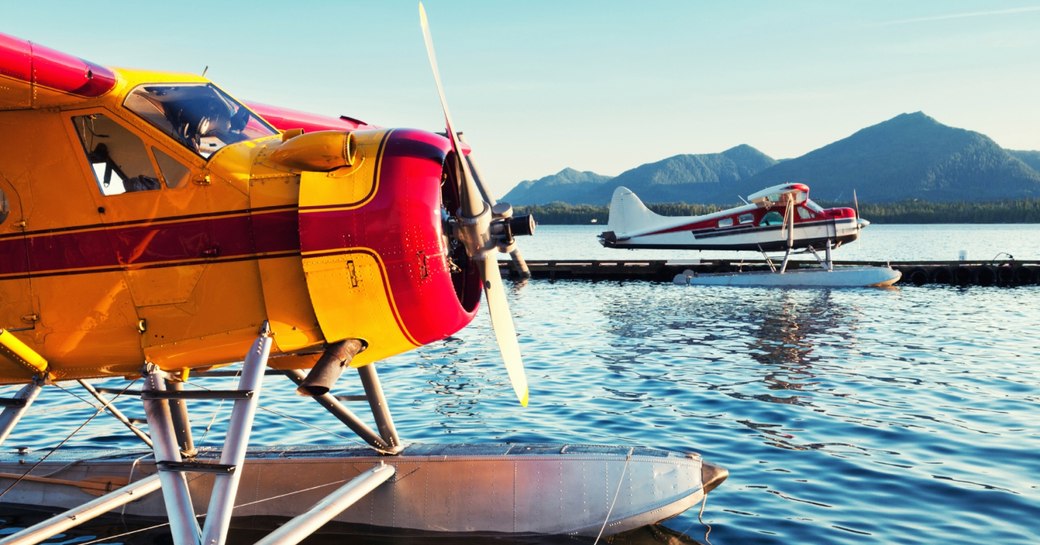 Two sea planes on water in Alaska