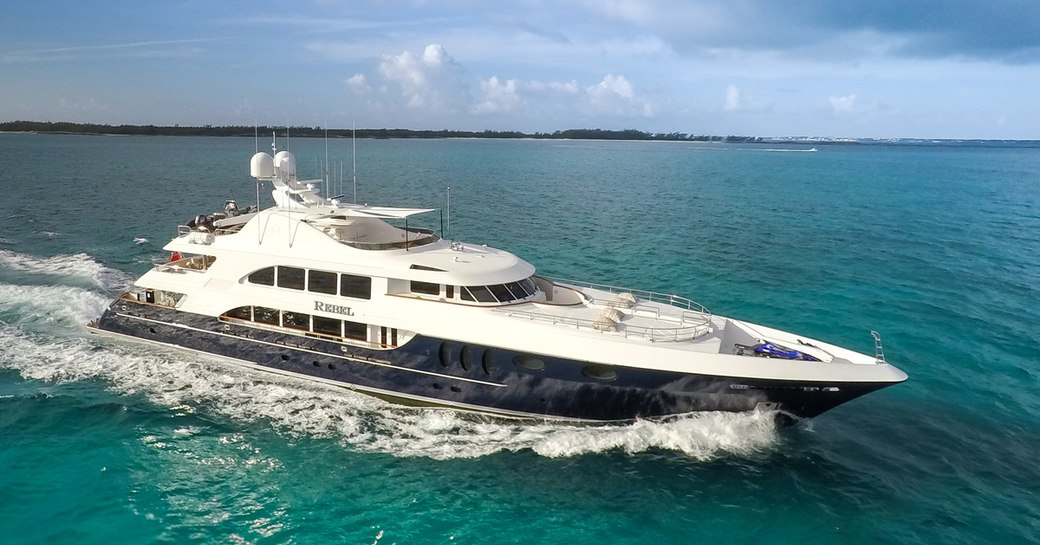 Profile shot of charter REBEL on the water with views of the Virgin Islands