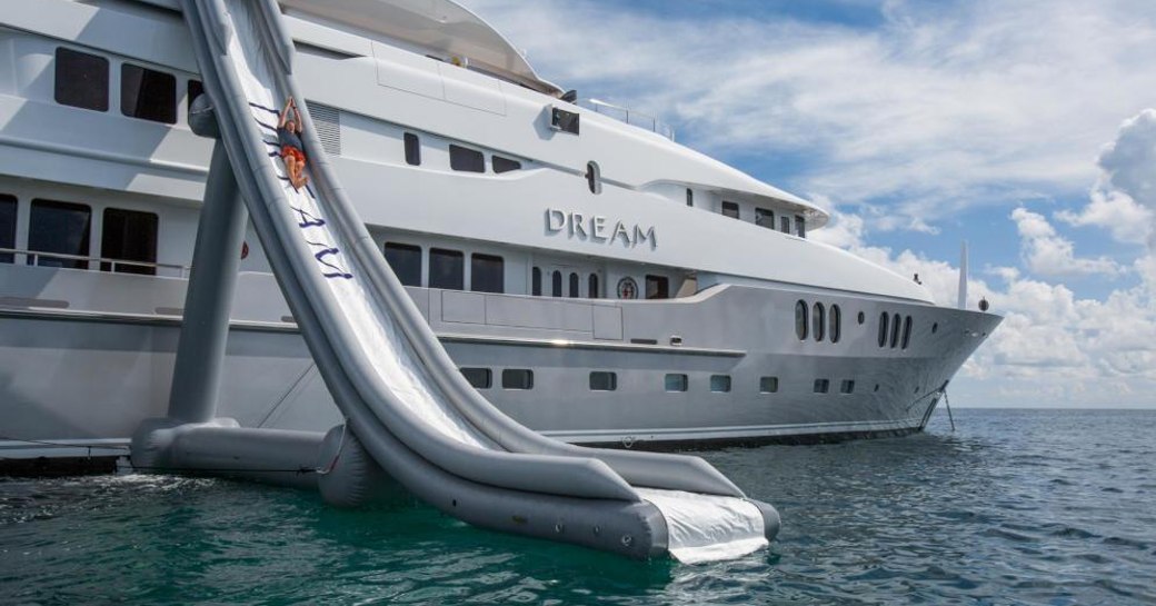 Superyacht DREAM with an inflatable slide attached to the sundeck