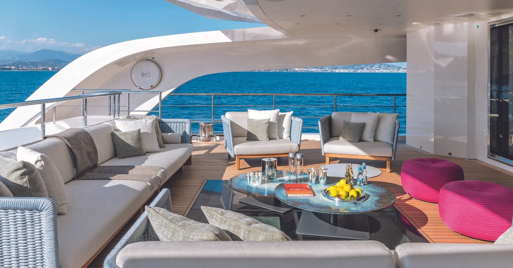 beautiful social space onboard luxury charter yacht