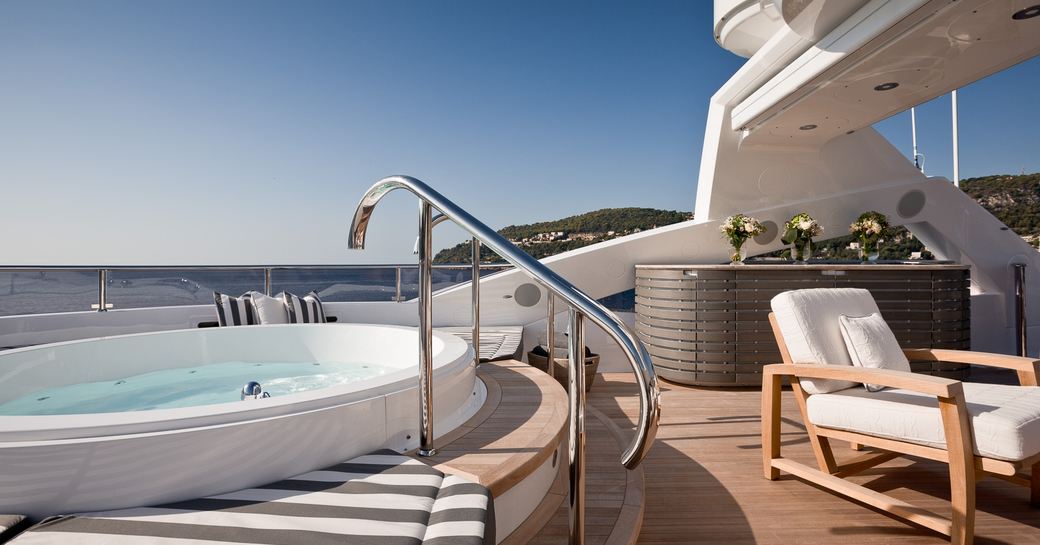 Superyacht THUMPER's deck Jacuzzi and sun loungers