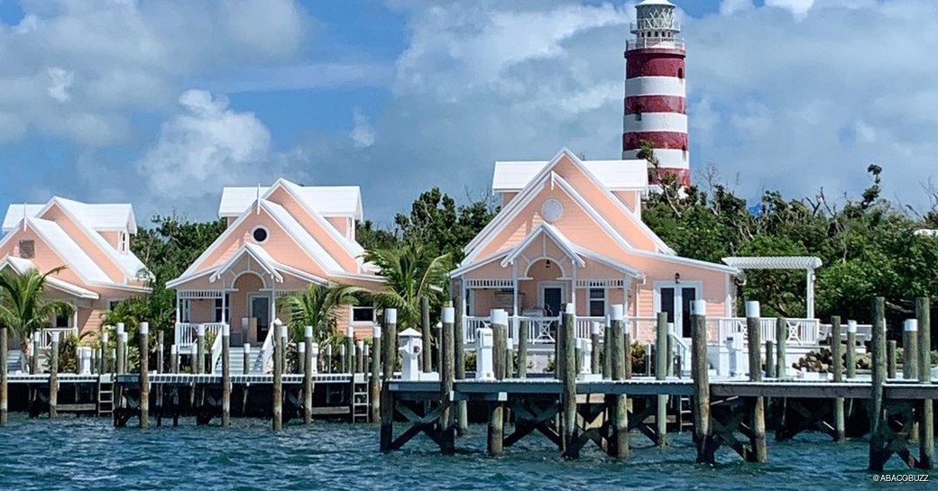 Brightly colored houses line Hope Town Marina