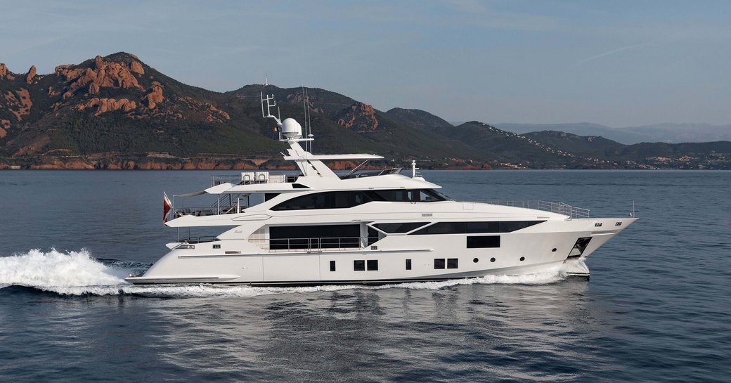 benetti superyacht Fast 145 underway with views over Italy in background