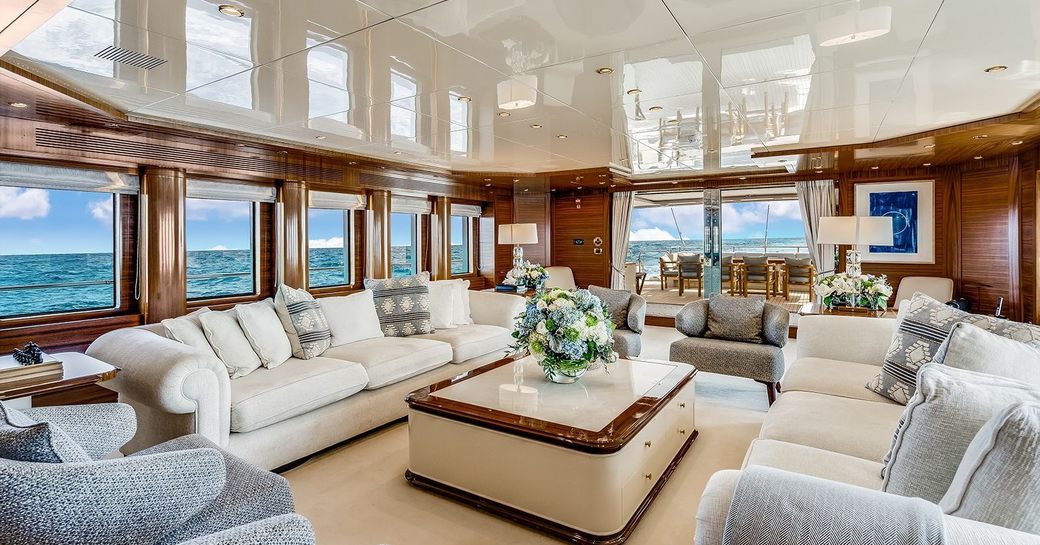 Main salon lounge area onboard charter yacht OCEANOS