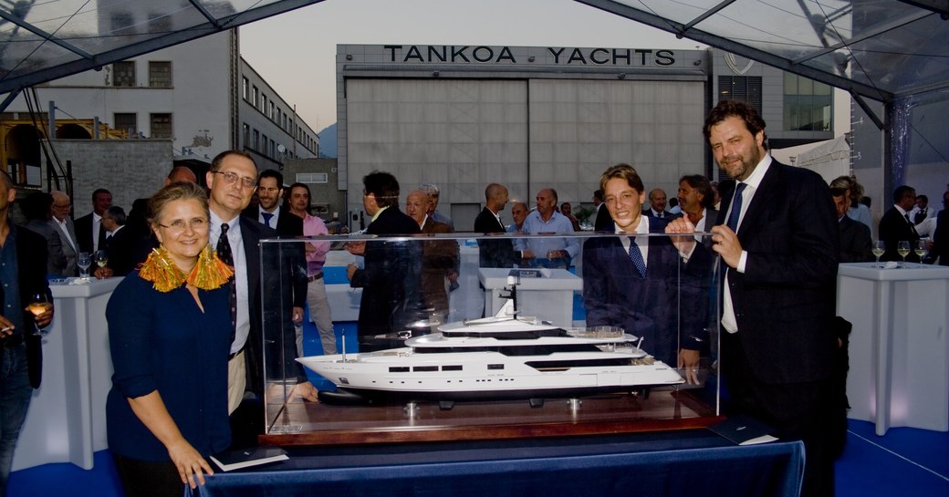 team behind superyacht suerte gather at launch at tankoa yachts in july