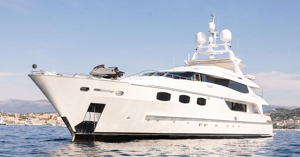 Charter yacht TIAMAT at anchor, surrounded by sea