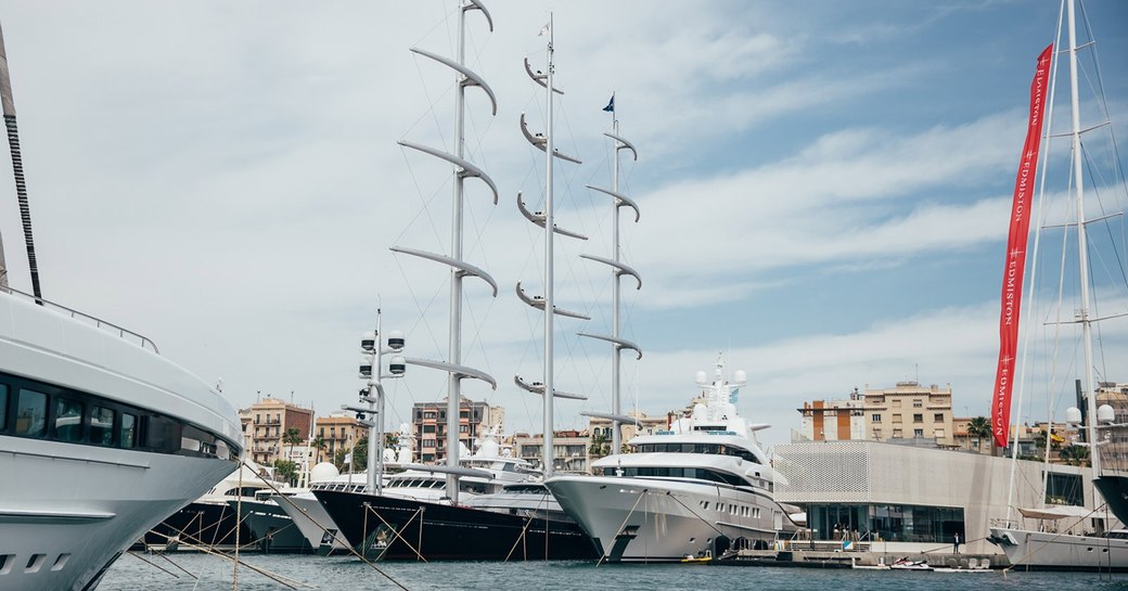 a fleet of mega yachts at anchor in palm beach Miami in preparation for the superyacht show palm beach