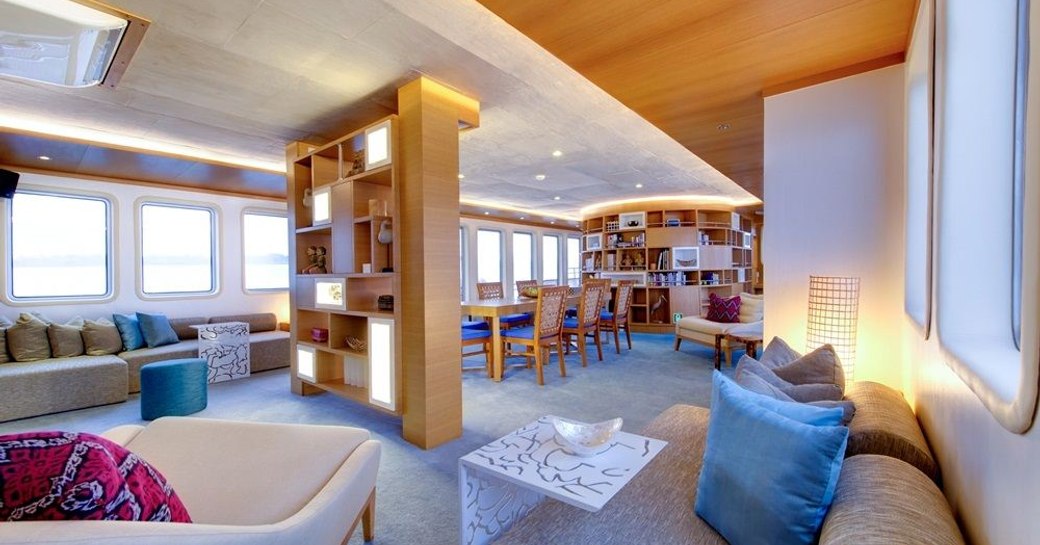 seating and dining area in the main salon aboard expedition yacht SALILA