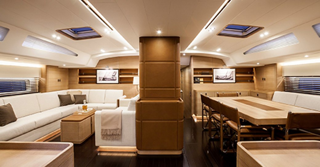 lounge and dining areas in main salon of charter yacht SHAMANNA