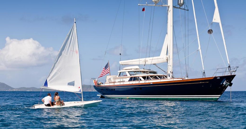 Charterers approach sailing yacht MARAE on an extended tender