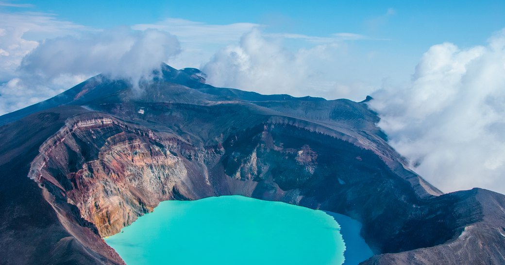 Crater of Gorely volcano with an acid lake