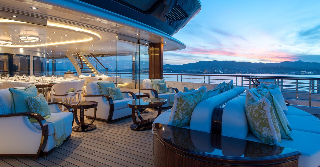 Alfresco lounging and dining area on superyacht TIS