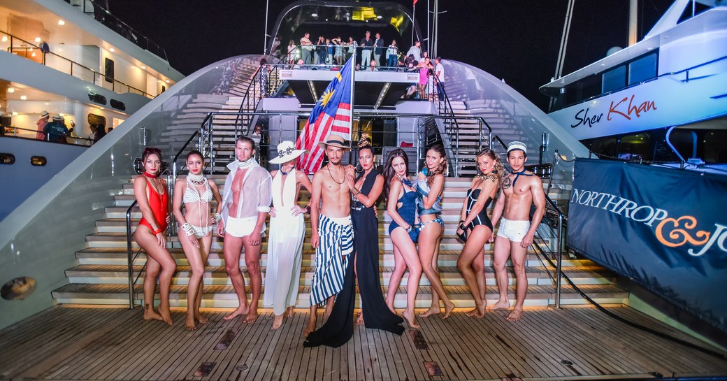 models line up on swim platform of superyacht Ocean Emerald for a glitzy fashion show at the Thailand Yacht Show 2016