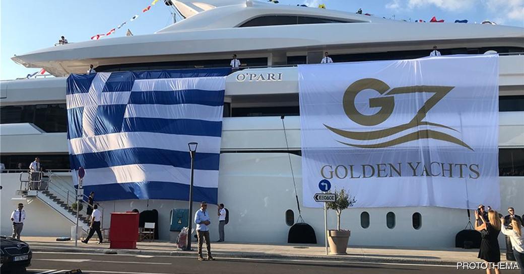 luxury yacht o'pari during delivery, with greek flag and shipyard flag on yacht