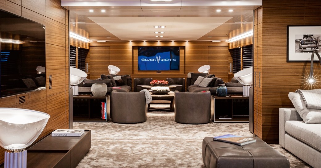 luxurious main salon with open-grain teak aboard superyacht ‘Silver Fast’ 